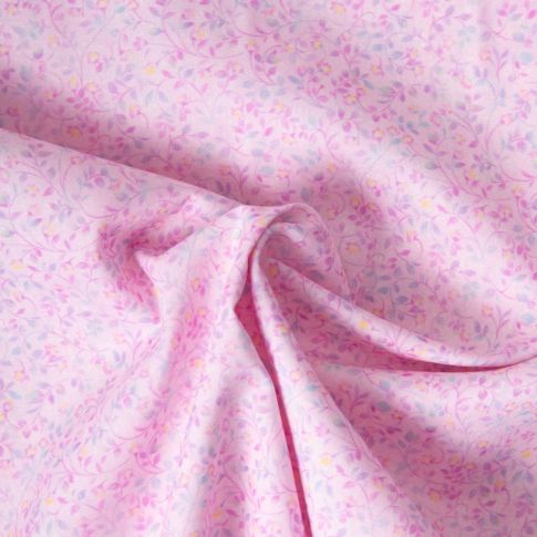 Tissu Popeline de Coton légère Fleur rose mauve et bleu pastel sur fond Rose pastel