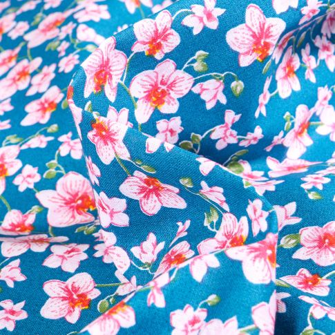 Tissu Coton imprimé Arty Orchidées sur fond Bleu