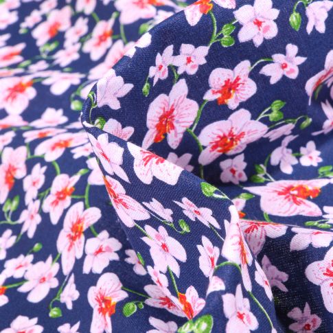 Tissu Coton imprimé Arty Orchidées sur fond Bleu nuit
