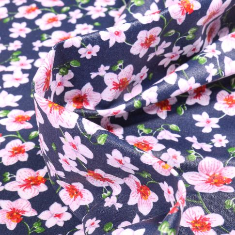 Tissu Coton enduit Orchidées bouquet sur fond Bleu marine