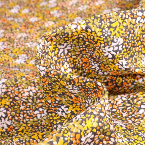 Tissu Coton imprimé Arty Clématite jaune sur fond Noir