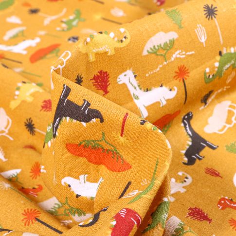 Tissu Coton imprimé Arty Dino colorés sur fond Jaune