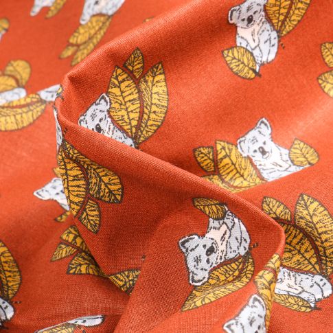 Tissu Coton imprimé Arty Koala sur fond Orange