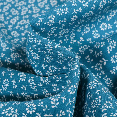 Tissu Viscose Arty Lison sur fond Bleu pétrole