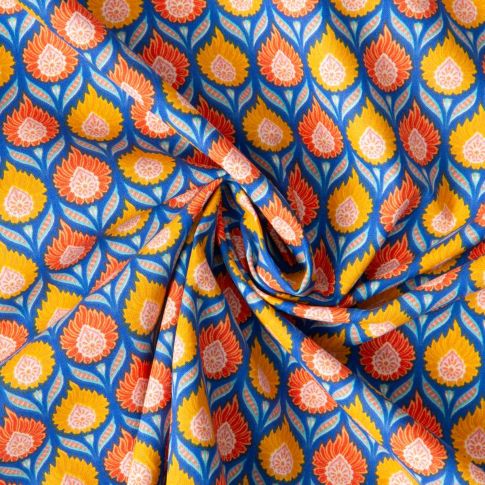 Tissu  Coton imprimé Arty Luka jaune orangé sur fond Bleu roi