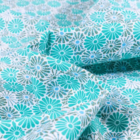 Tissu Coton imprimé Arty Nikki sur fond Bleu turquoise
