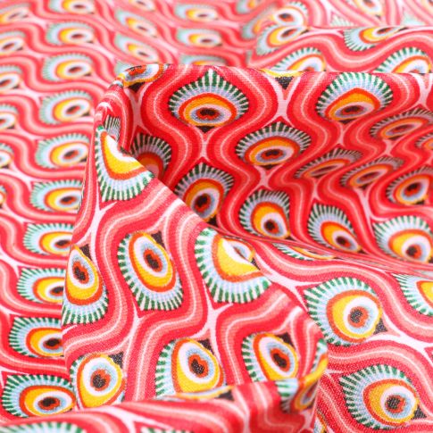 Tissu Coton enduit Feuilles de Paon sur fond Rose