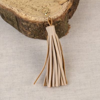 Pompon avec fermoir Beige