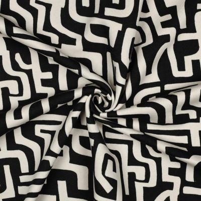 Tissu Sweat envers polaire Côme labyrinthe écru sur fond Noir - Par 10 cm
