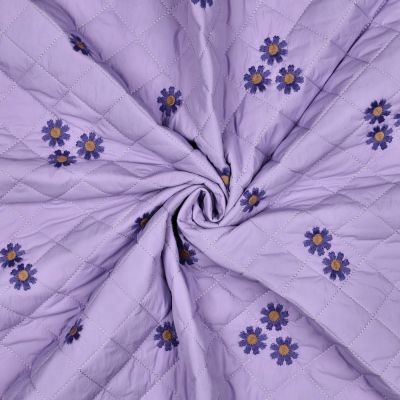 Tissu Matelassé Sarah fleurs brodées sur fond Lilas - Par 10 cm