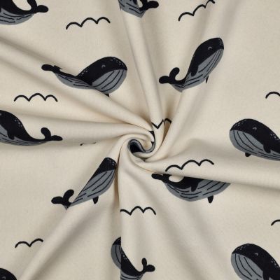 Tissu Sweat envers polaire Timéo baleines sur fond Ecru - Par 10 cm
