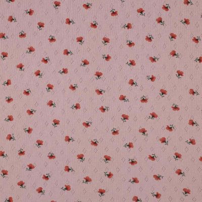 Tissu Jersey Coton ajouré Petites roses rouges sur fond Rose - Par 10 cm