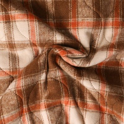 Tissu Matelassé Ciarra tout doux  envers doudoune carreaux Oranges et Bruns sur fond Beige - Par 10 cm