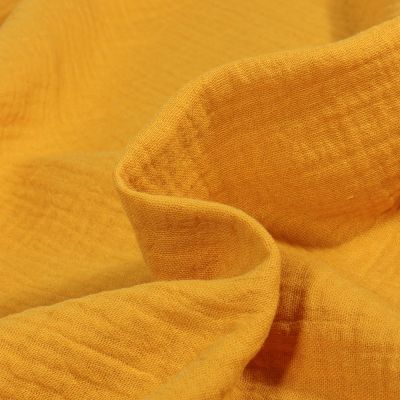 Tissu Double gaze uni Bio Jaune curry - Par 10 cm