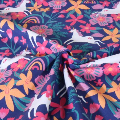 Tissu Popeline de Coton Poppy Licorne sur fond Bleu foncé - Par 10 cm