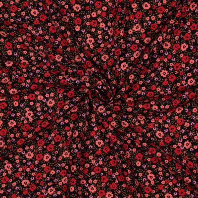 Tissu Viscose imprimé Petites fleurs Corail et Rouge sur fond Noir - Par 10 cm