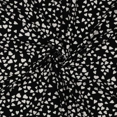 Tissu Viscose EcoVero petits coeurs Blanc sur fond Noir - Par 10 cm