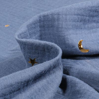Tissu Double gaze Lunes et étoiles dorées sur fond Bleu ancien - Par 10 cm