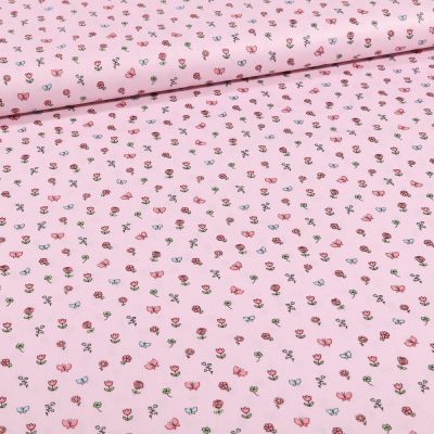 Tissu Coton imprimé Petits bouquets de fleurs et papillons sur fond Rose - Par 10 cm