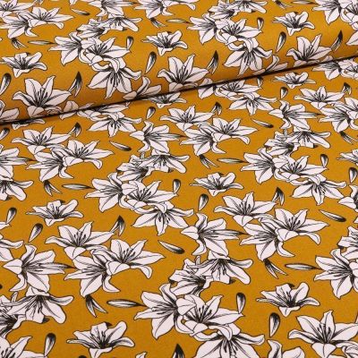 Tissu Toile Coton Lys blancs et noirs sur fond Jaune moutarde - Par 10 cm