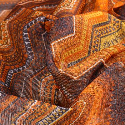 Tissu Mousseline Tissu Chevrons colorés sur fond Orange - Par 10 cm