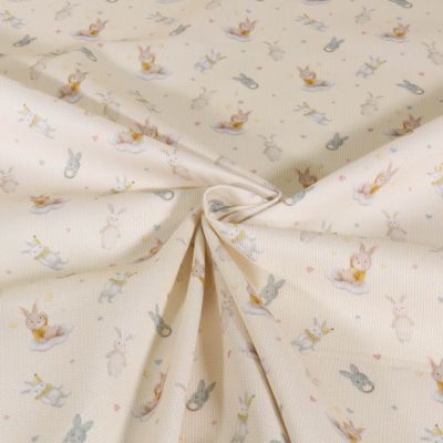 Tissu Piqué de Coton imprimé Lapinou sur fond Beige clair - Par 10 cm