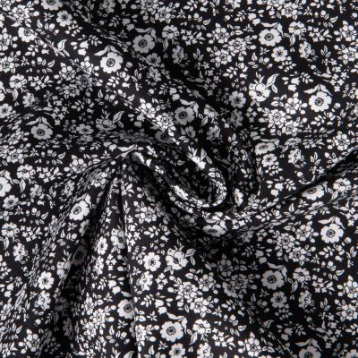 Tissu Coton imprimé Lutos Pia sur fond Noir - Par 10 cm