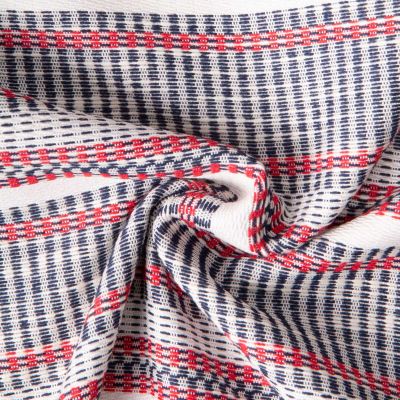 Tissu Jacquard Polycoton lurex Neela rayures Bleu et Rouge sur fond Blanc cassé - Par 10 cm