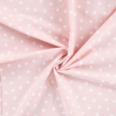 Tissu Popeline de Coton  patounes blanches Zumi sur fond Rose clair - Par 10 cm
