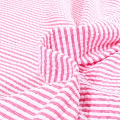 Tissu Seersucker Stretch Rayé sur fond Rose - Par 10 cm