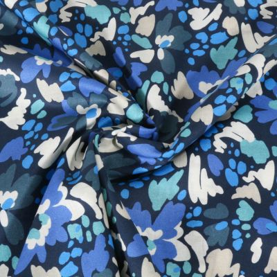 Tissu Voile de Coton digital Fleurs colorées bleues et écrues sur fond Bleu marine - Par 10 cm