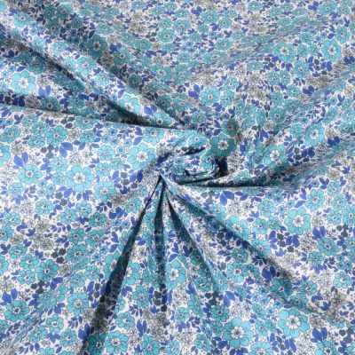Tissu Voile de Coton digital Petites fleurs bleue turquoise sur fond Blanc - Par 10 cm
