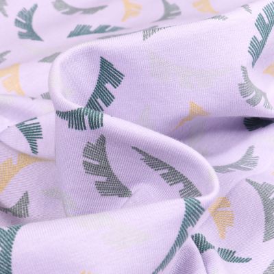 Tissu Jersey Coton Bio Feuilles héra sur fond Parme - Par 10 cm