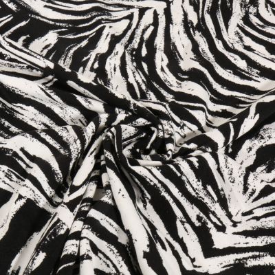 Tissu Jersey Viscose imprimé Motif zébré noir sur fond Blanc - Par 10 cm