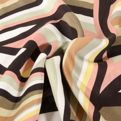 Tissu Viscose satiné Op art sur fond Vert kaki - Par 10 cm