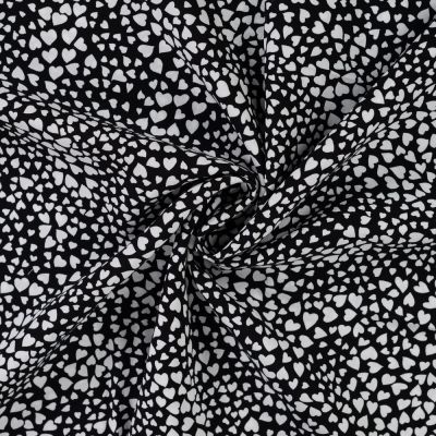 Tissu Viscose imprimé Petits coeurs blancs sur fond Noir - Par 10 cm