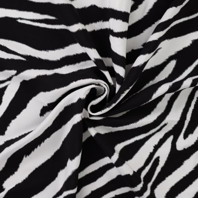 Tissu Viscose imprimé Motif zébré sur fond Noir - Par 10 cm