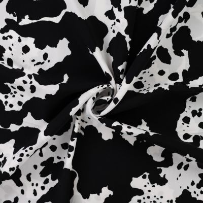 Tissu Viscose imprimé Taches noires sur fond Blanc - Par 10 cm