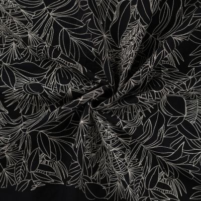 Tissu Coton brodé imprimé Floral sur fond Noir - Par 10 cm