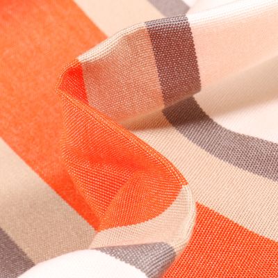 Tissu Toile extérieure grande largeur Dralon Tango sur fond Orange - Par 10 cm