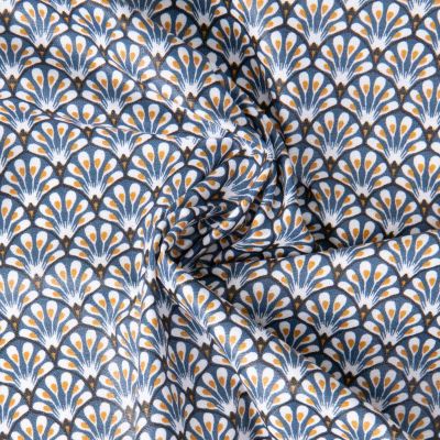 Tissu Coton enduit Gaudi sur fond Bleu pétrole - Par 10 cm