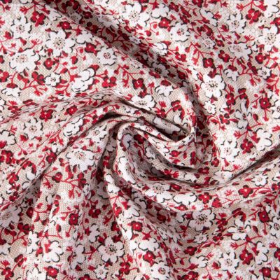 Tissu Toile Polycoton Liana fleurs Blanc et Rouge sur fond Naturel - Par 10 cm