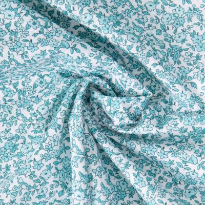 Coupon Tissu Coton Enduit Fleuris Léonie menthe et bleu sur fond Blanc - Coupon de 3 mètres