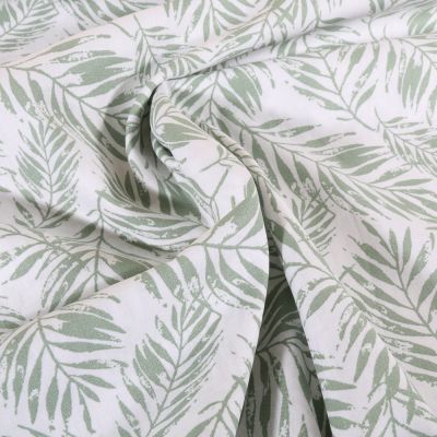 Tissu Popeline de Coton Feuillage vert amande sur fond Blanc cassé - Par 10 cm
