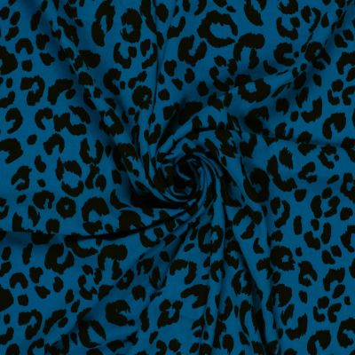 Tissu Twill extensible imprimé Léopard sur fond Bleu indigo - Par 10 cm