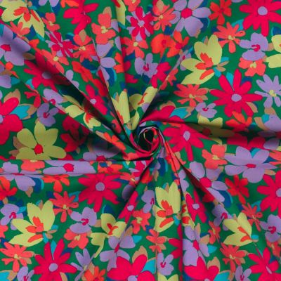 Tissu Coton stretch imprimé Fleurs rouge et lilas sur fond Vert - Par 10 cm