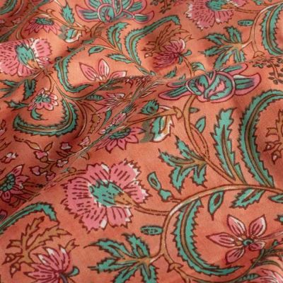 Tissu Voile de Coton Isadora fleurs roses sur fond Orange - Par 10 cm