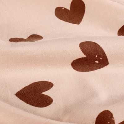 Tissu Jersey Coton Coeurs Marron foncé sur fond Rose pâle - Par 10 cm