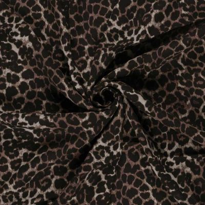 Tissu Crêpe de Viscose Eve panthère sur fond Noir - Par 10 cm