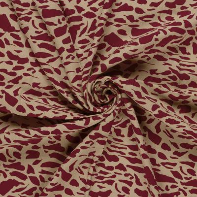 Tissu Viscose twill Nola motif animalier sur fond Bordeaux - Par 10 cm